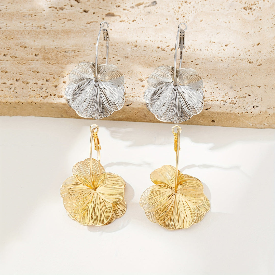 Boucles d'oreilles creuses et exagérées en or