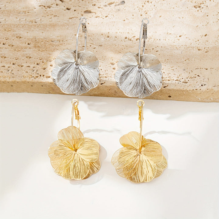 Boucles d'oreilles creuses et exagérées en or