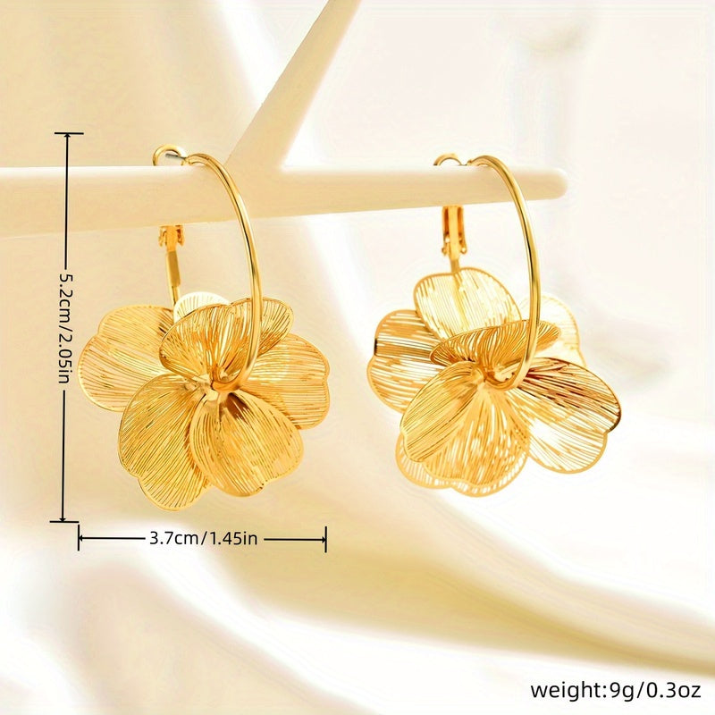 Boucles d'oreilles creuses et exagérées en or