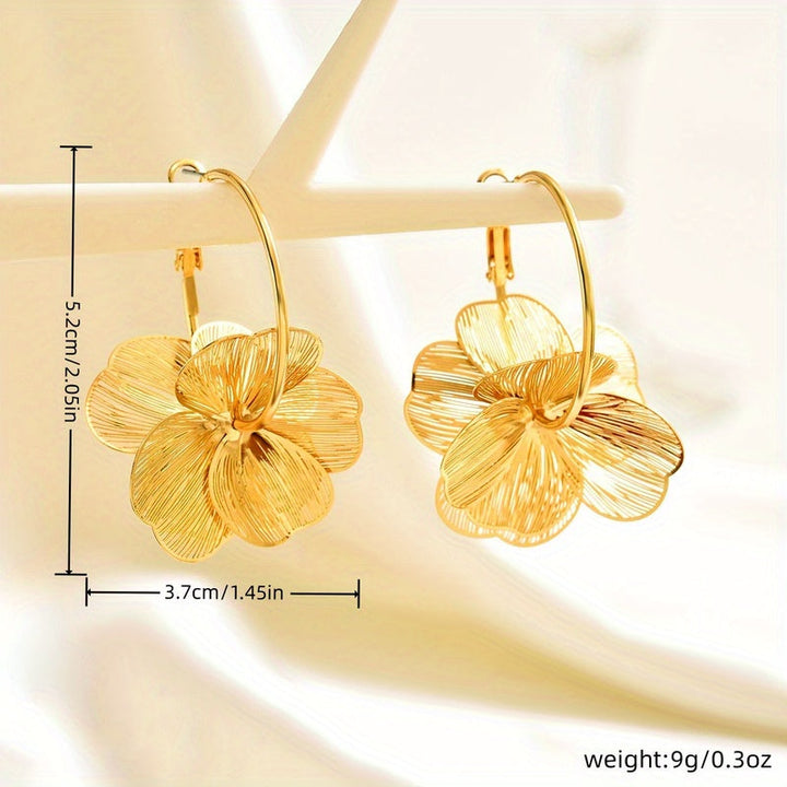 Boucles d'oreilles creuses et exagérées en or