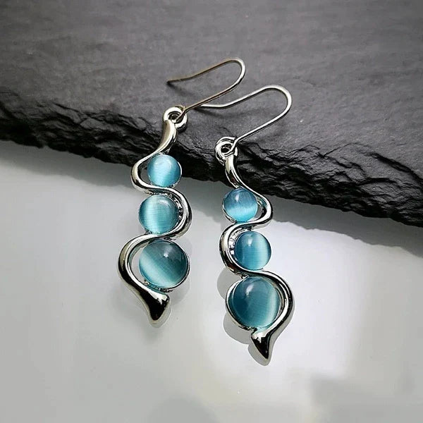 Boucles d'oreilles pendantes en cristal bleu