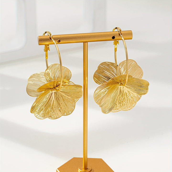 Boucles d'oreilles creuses et exagérées en or