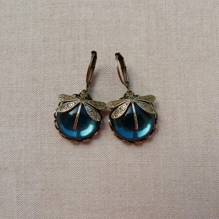 Boucles d'oreilles en cristal bleu avec cristal bleu en or antique