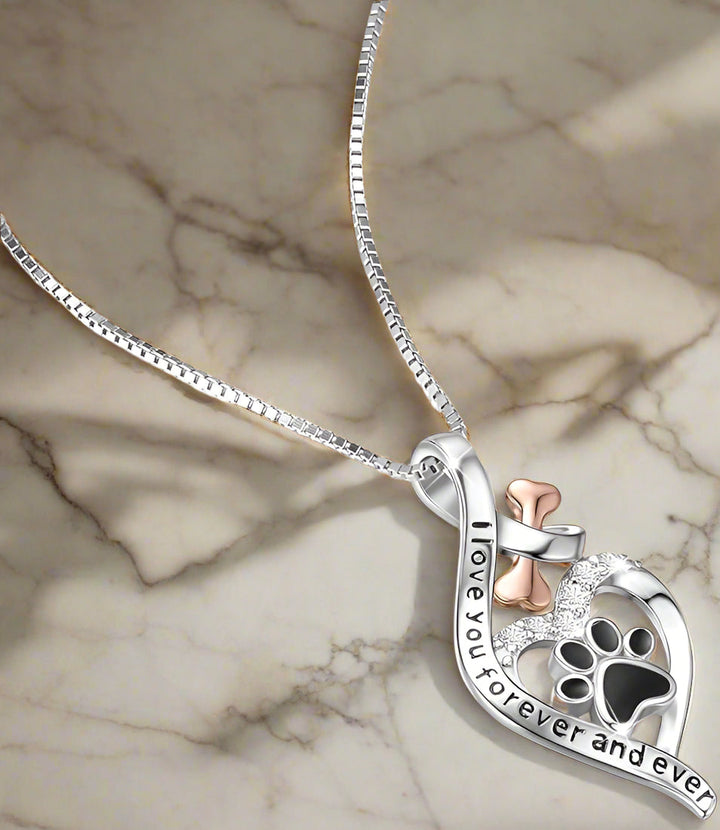 Collier Patte Chanceuse avec Cœur, Os & Infini – Pendentif “Toujours dans Mon Cœur”