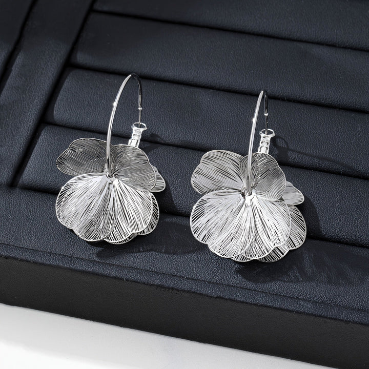 Boucles d'oreilles creuses et exagérées en or